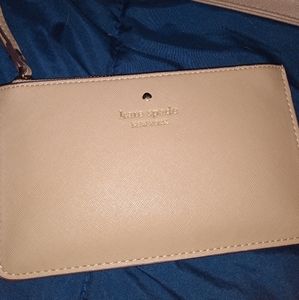 Two wallets and one is a wrist wallet.